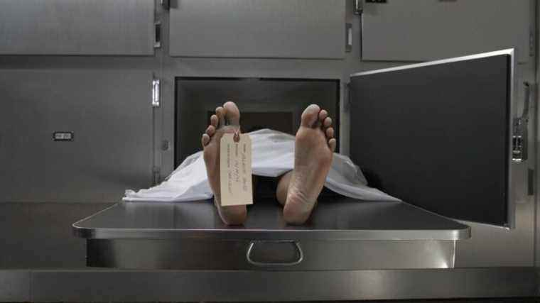 a woman found alive in the refrigerator of a morgue