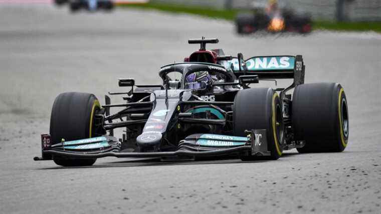 Lewis Hamilton goes through the drops in Russia and signs his 100th career victory