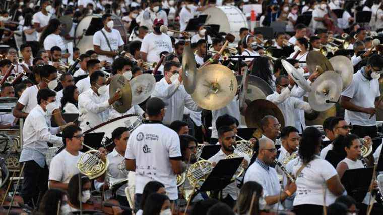 Andrès David Ascanio, the Venezuelan conductor, has 12,000 musicians play together, in contention for the Guinness World Records