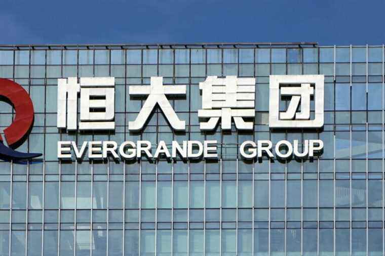 China |  Evergrande group avoids payment default