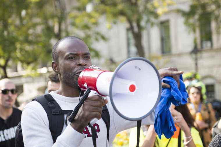 François Amalega arrested during an activity of François Legault