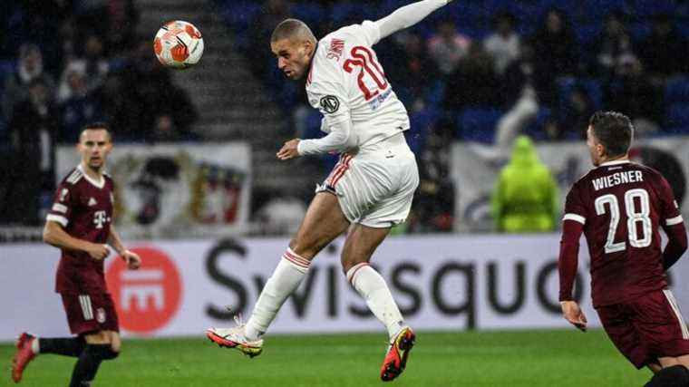 OL win thanks to a double from Islam Slimani and qualify for the knockout stages of the Europa League