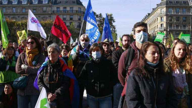 in Paris, demonstrators gather against climate inaction in the midst of COP26