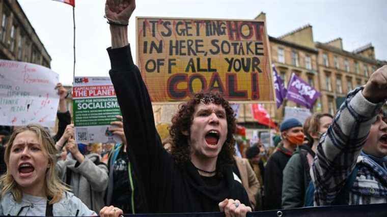 thousands of young people march through the streets of Glasgow to call on leaders to action