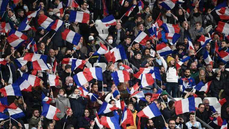 two years later, supporters celebrating their return to Stade de France