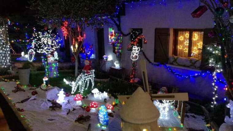 A few days before Christmas, decorated houses light up their neighborhoods