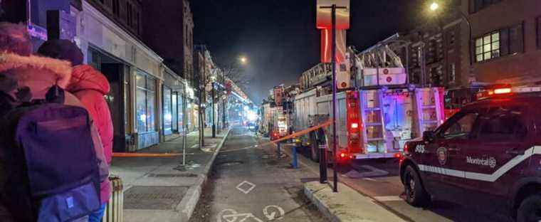 A fire rages in a building in Plateau-Mont-Royal