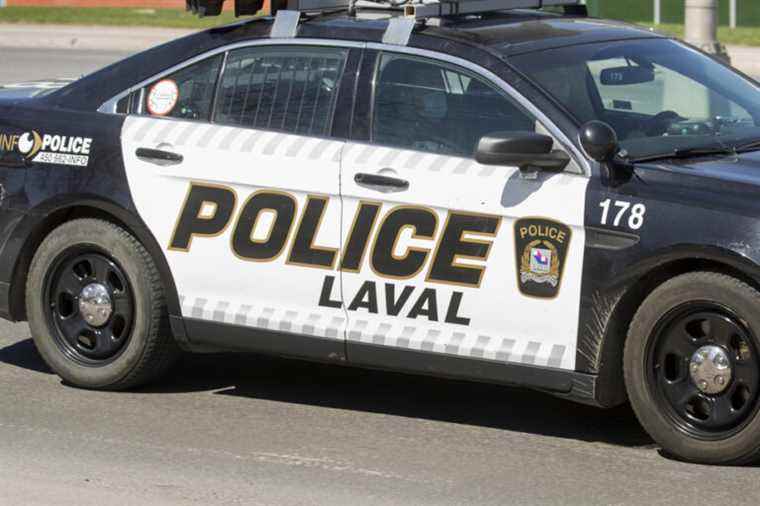 A young adult shot in a Laval library