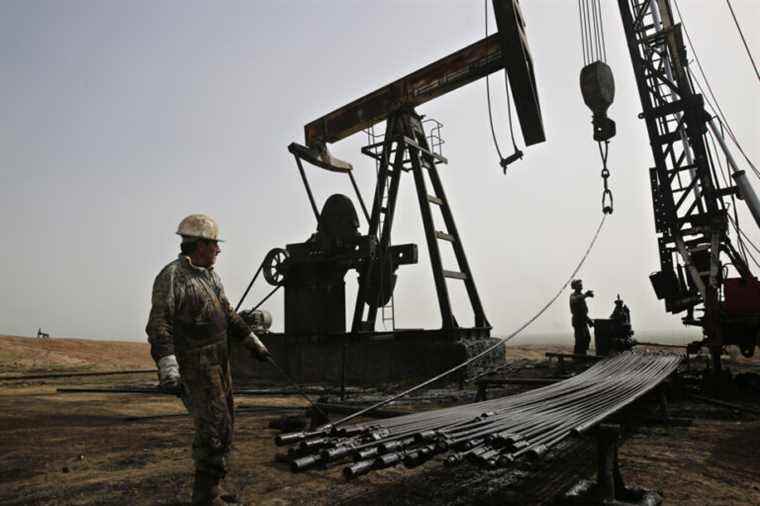 Oil retreats, worried about China