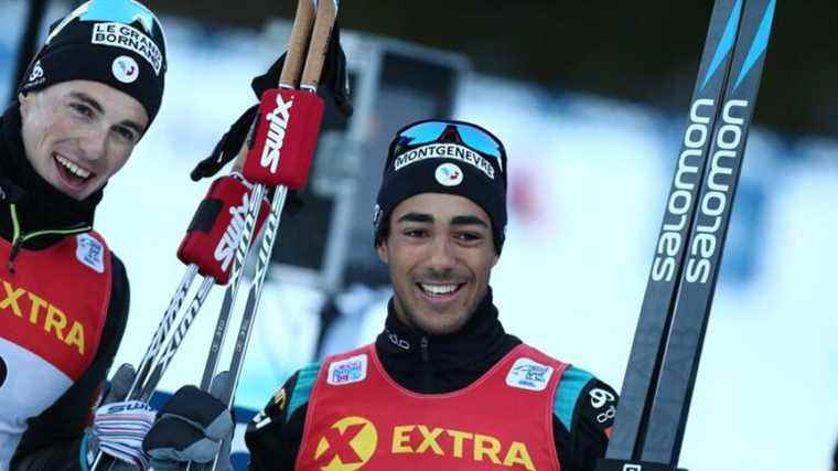 Richard Jouve and Lucas Chanavat on the podium of the first stage of the Tour de ski