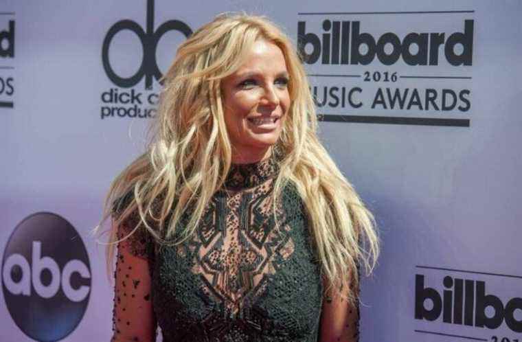 Surprise!  With baby bottle in hand, singer Britney Spears celebrates ‘arrival of a new member’ in her family