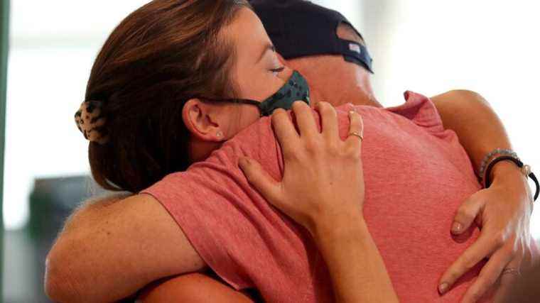 an alternative to the French kiss, the American “hug”