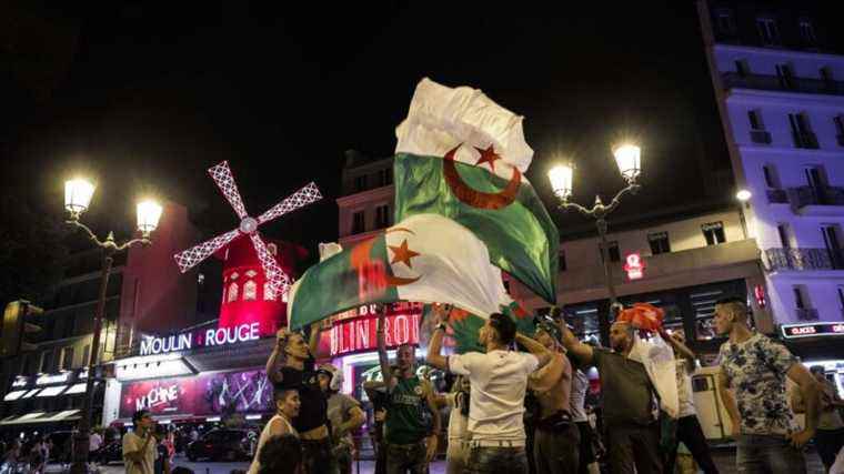 tensions between supporters and police on the Champs-Elysées after the coronation of Algeria