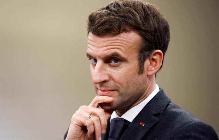 What is Emmanuel Macron waiting for to declare himself a candidate for the French presidential election?