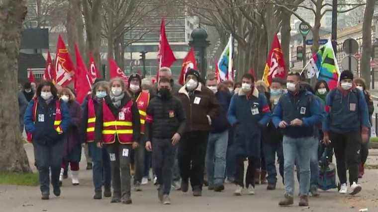 the employees of the subcontractors march in front of Bercy to protest against the job cuts