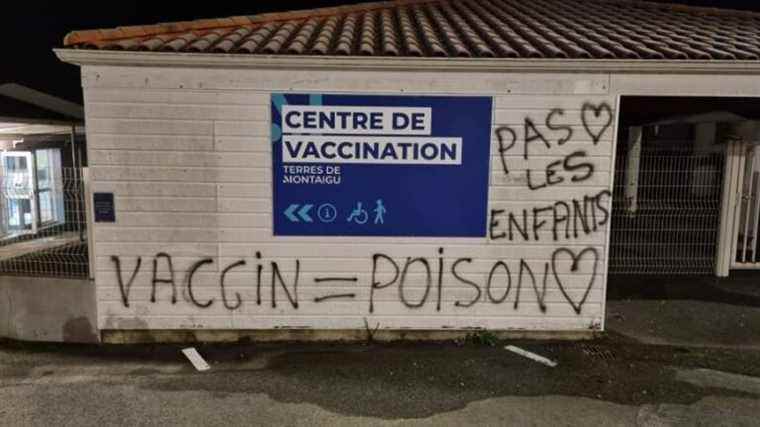 the facade of the vaccination center tagged in the night