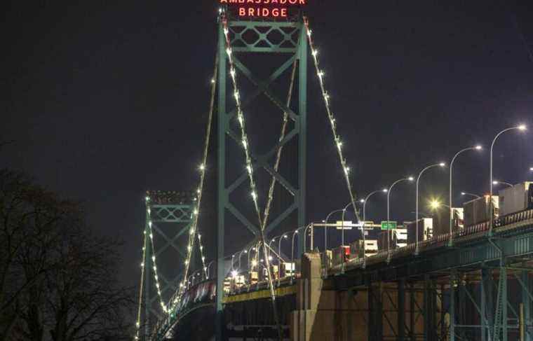 A bridge between Windsor and Detroit is blocked by truckers