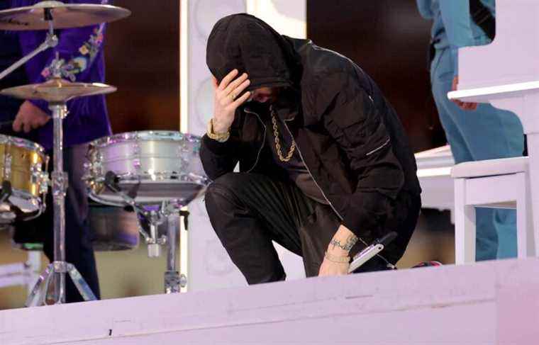 Eminem takes a knee during Super Bowl halftime