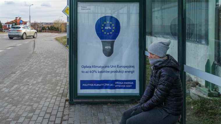 In Poland, a poster campaign accuses the climate tax imposed by Europe of soaring energy prices