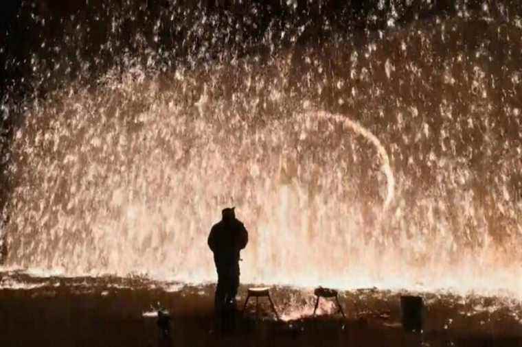 Molten iron lights up Beijing’s sky