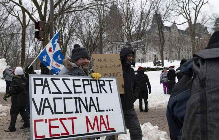 Protesters and tourists share the street in Quebec