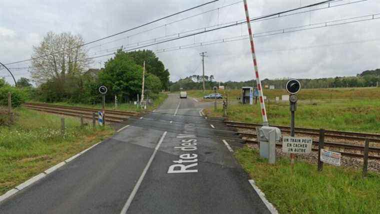 a train hits a car, the motorist is only slightly injured