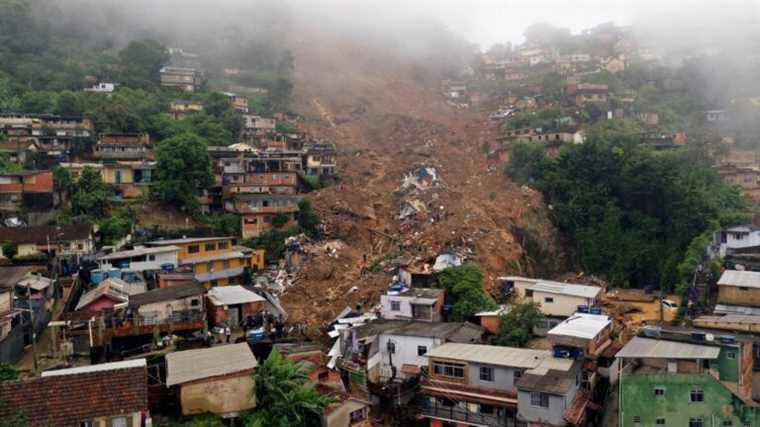 at least 44 dead in landslides and floods caused by heavy rains in Petropolis