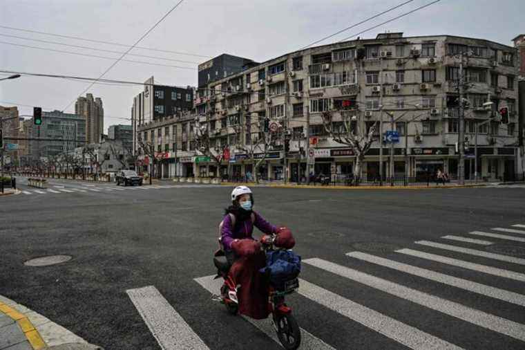 China |  Half of Shanghai confined for four days