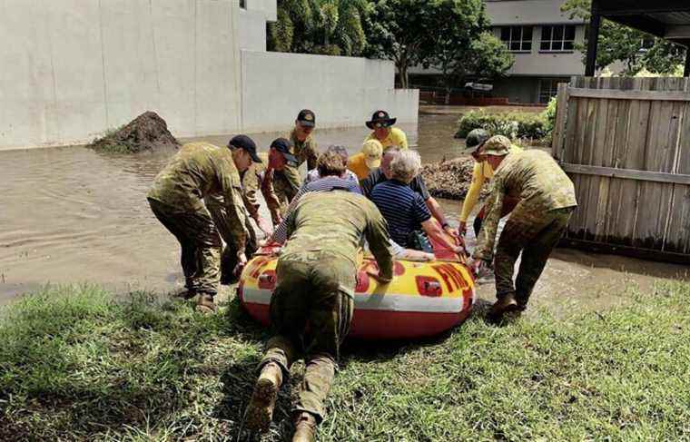 Floods kill at least 12 in Australia