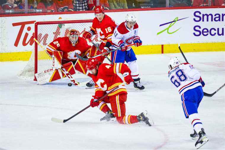 The Canadiens defeat the Flames 5-4 in overtime