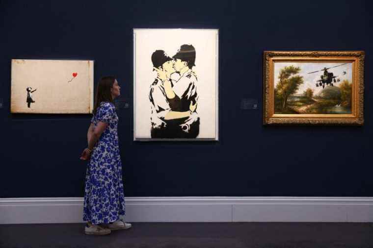 Two works by Banksy reach millions in London