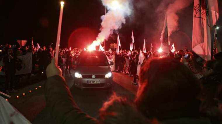 his coffin welcomed by a guard of honor in Ajaccio