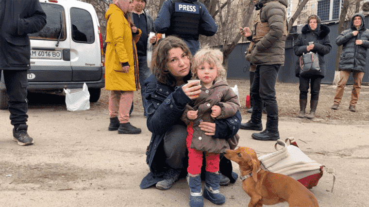 whole families flee fighting in Irpin, walking ‘among burning houses, missiles above our heads’