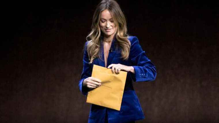 Actress Olivia Wilde receives custody papers during speech at CinemaCon in Las Vegas