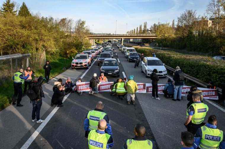 Climate activists briefly block a highway in Switzerland