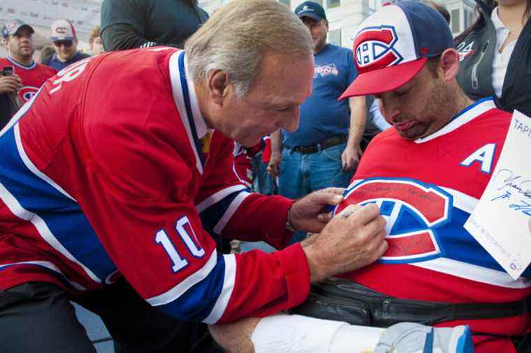 The man behind the hockey player