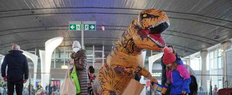 Ukrainian children comforted by dinosaurs