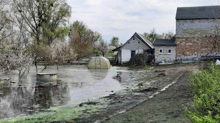 the Ukrainian village of Demydiv under water to halt the advance of the Russians