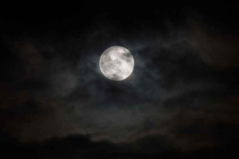 A lunar eclipse, despite the clouds