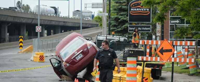 [PHOTOS] A policeman and a construction worker hit by a car