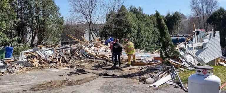 [PHOTOS] Garbage truck wrecks residence