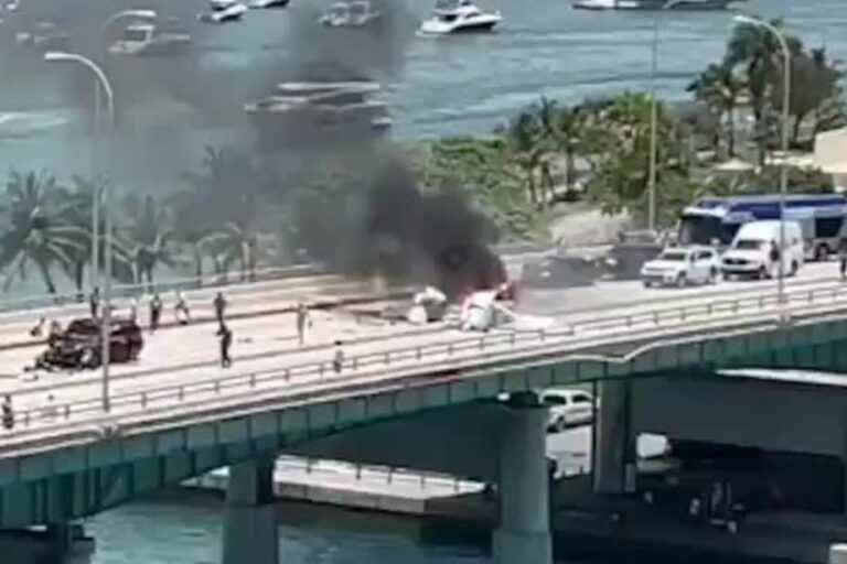 Small plane crashes into Miami bridge