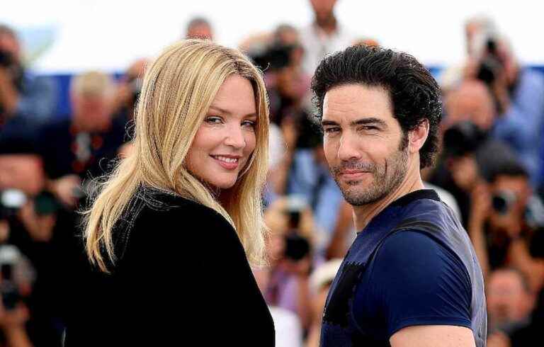 Split black dress and sublime neckline, Virginie Efira incendiary on the arm of Tahar Rahim during the Cannes Film Festival