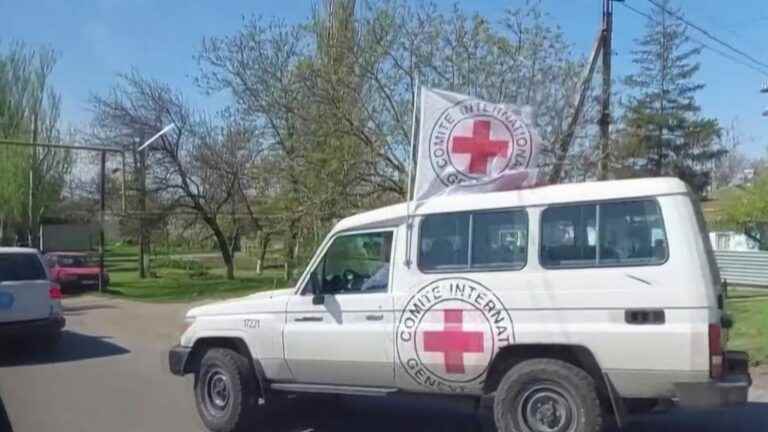 a difficult evacuation of civilians in Mariupol, a destroyed city