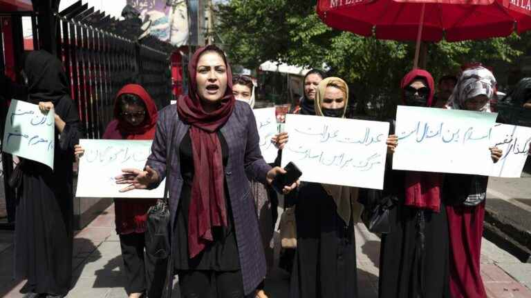 a dozen women demonstrate in Kabul against the full veil