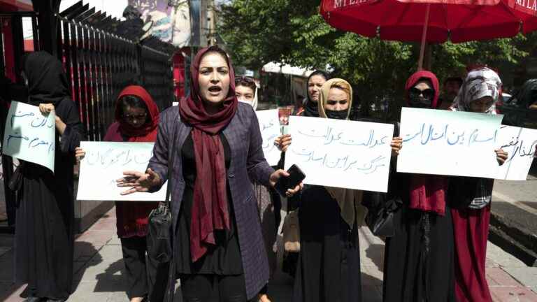 twenty women demonstrate in Kabul for their rights