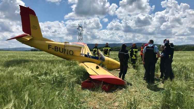 two men injured in emergency landing