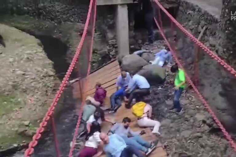 A suspension bridge creaks during the inauguration in Mexico