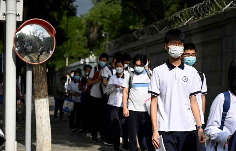 Beijing postpones reopening of schools after new wave of COVID