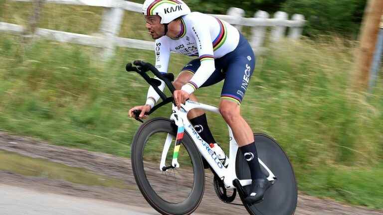 Filippo Ganna wins hotly contested time trial, Wout van Aert stays in yellow